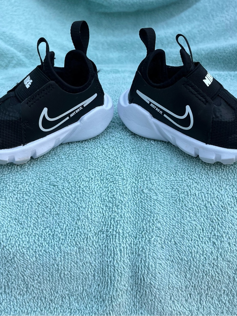 Nike Kids Black and White Slip-On Sneakers